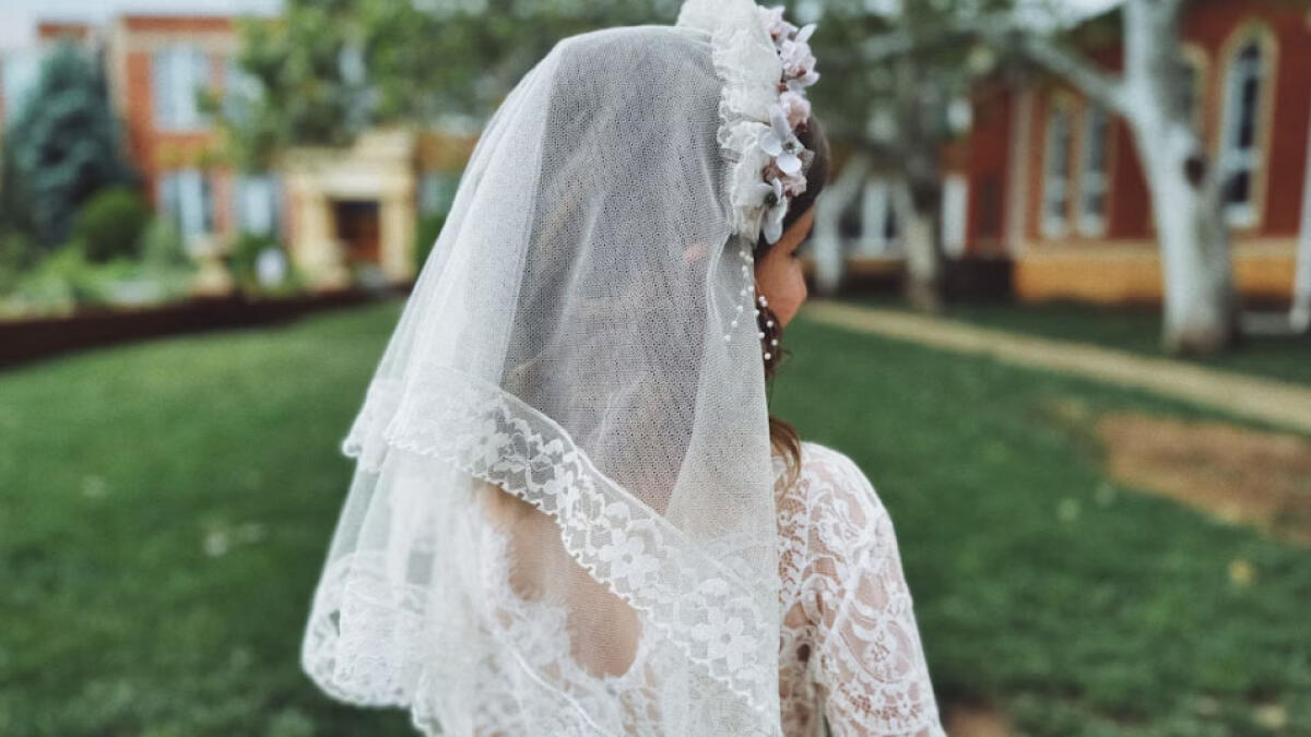 Minaccia di morte la moglie durante la prima comunione della figlia - 