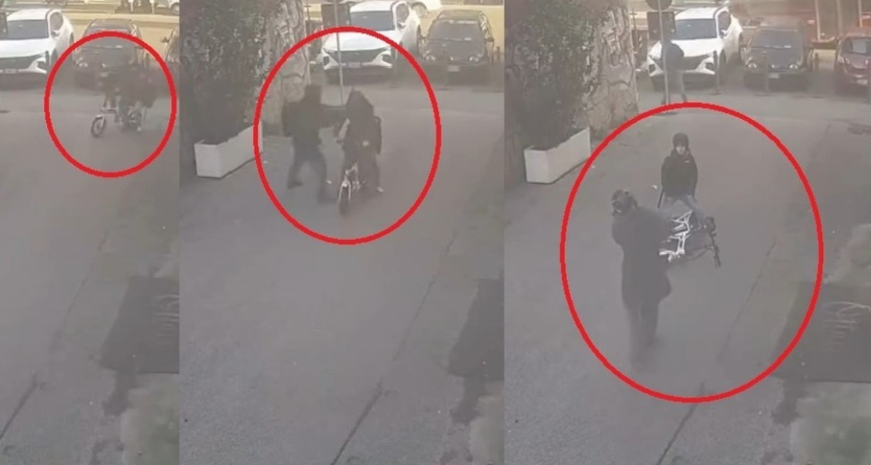 Mamma presa a pugni mentre va in bici col figlioletto - 