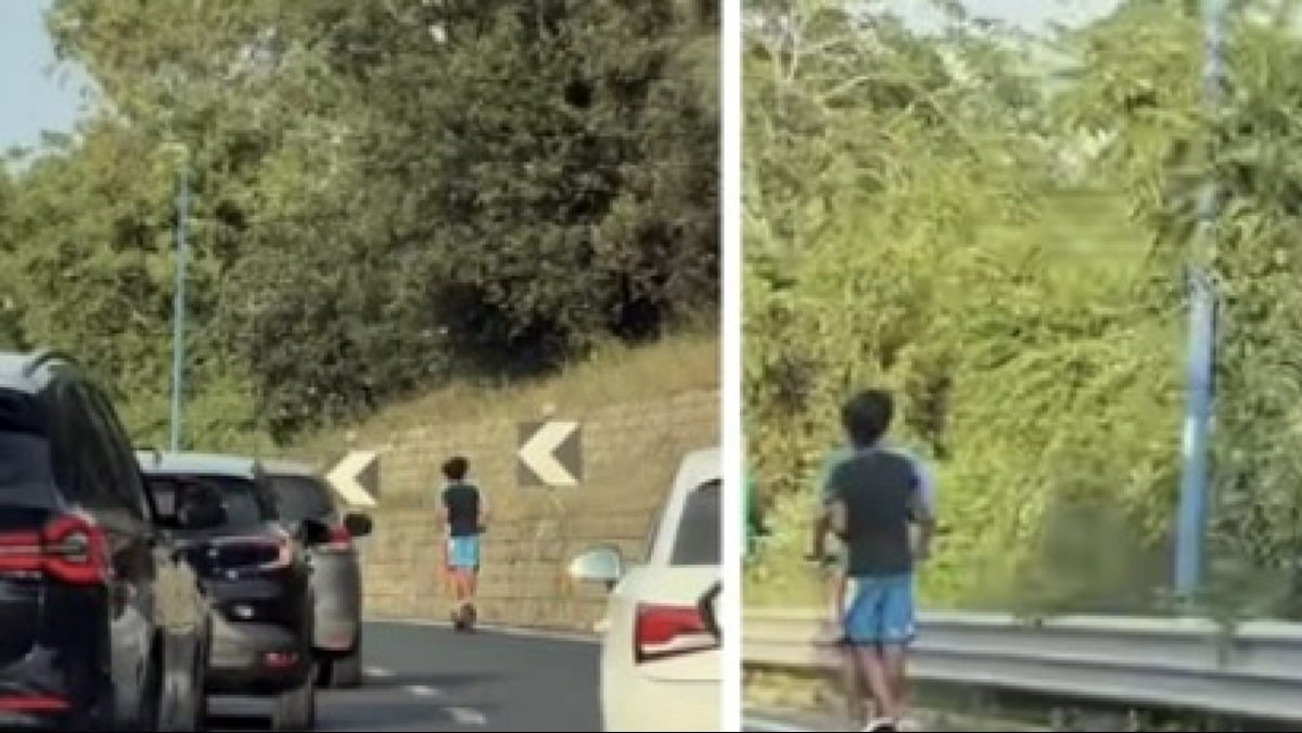 Due ragazzini su un monopattino in Tangenziale - 